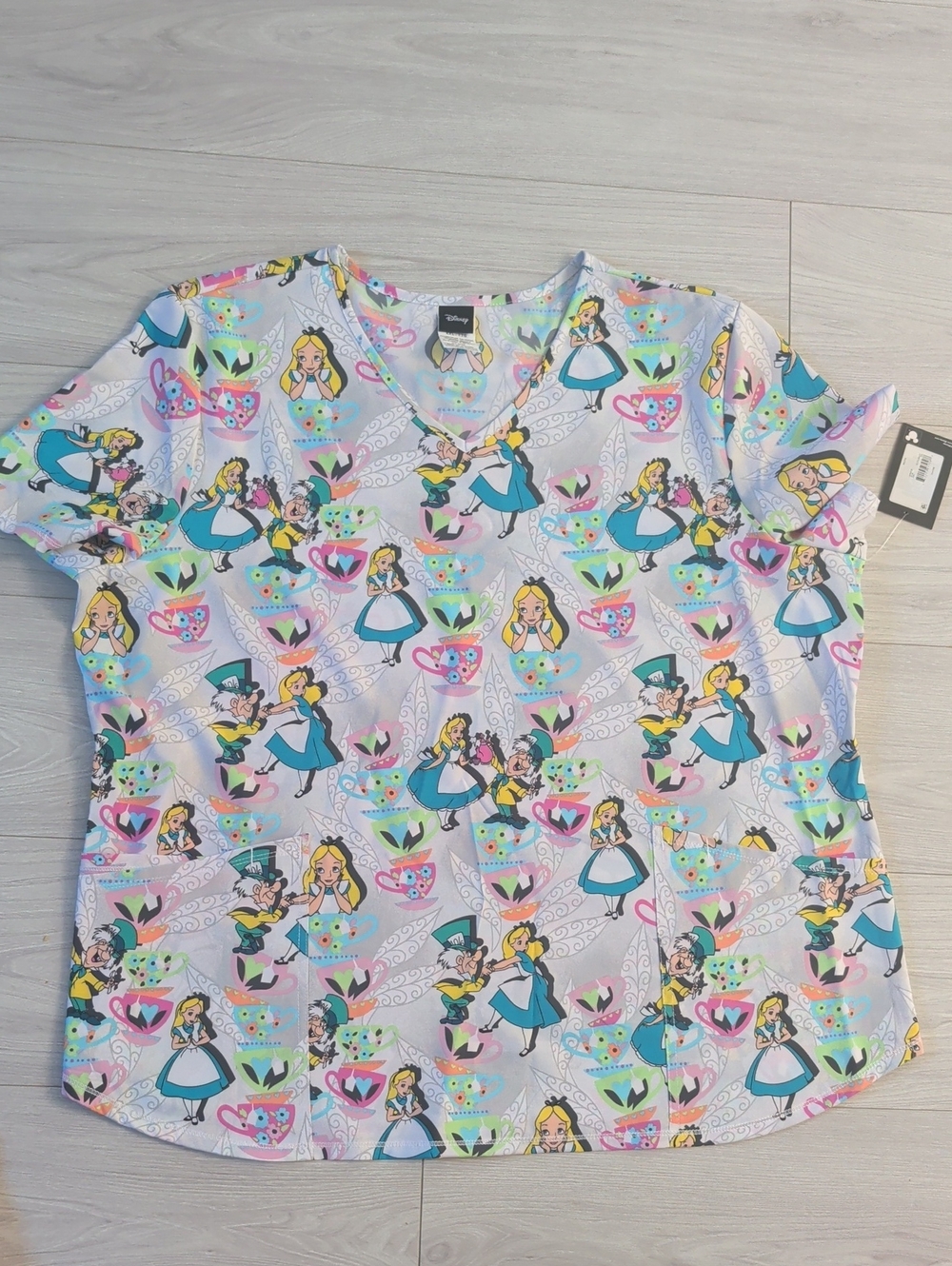 Disney Alice Allover Print Short Sleeve Scrub/Nurs Tee - Light Gray, Blue & Pink